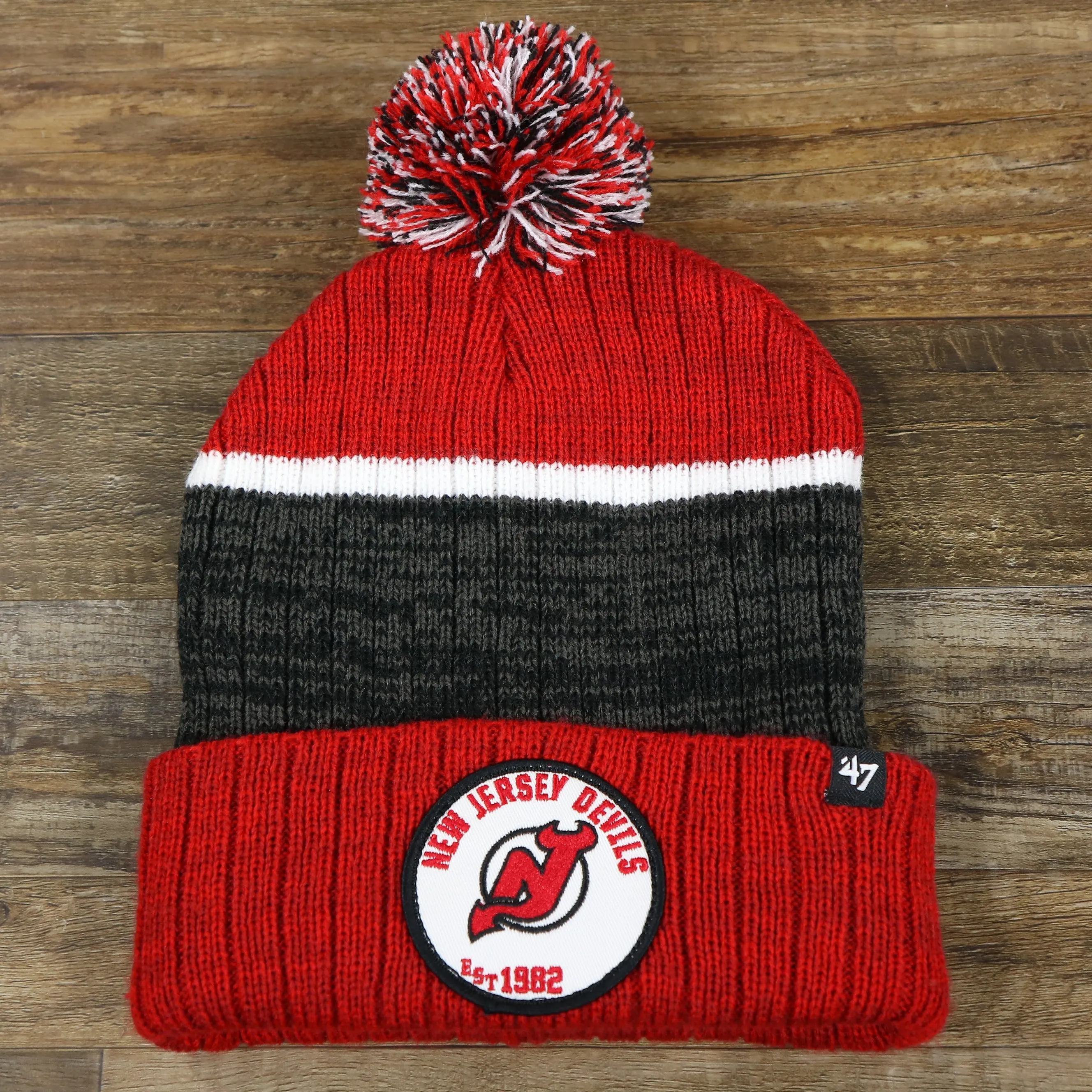 New Jersey Devils Winter Beanie - Red and Gray Striped Cuffed Pom Pom Hat