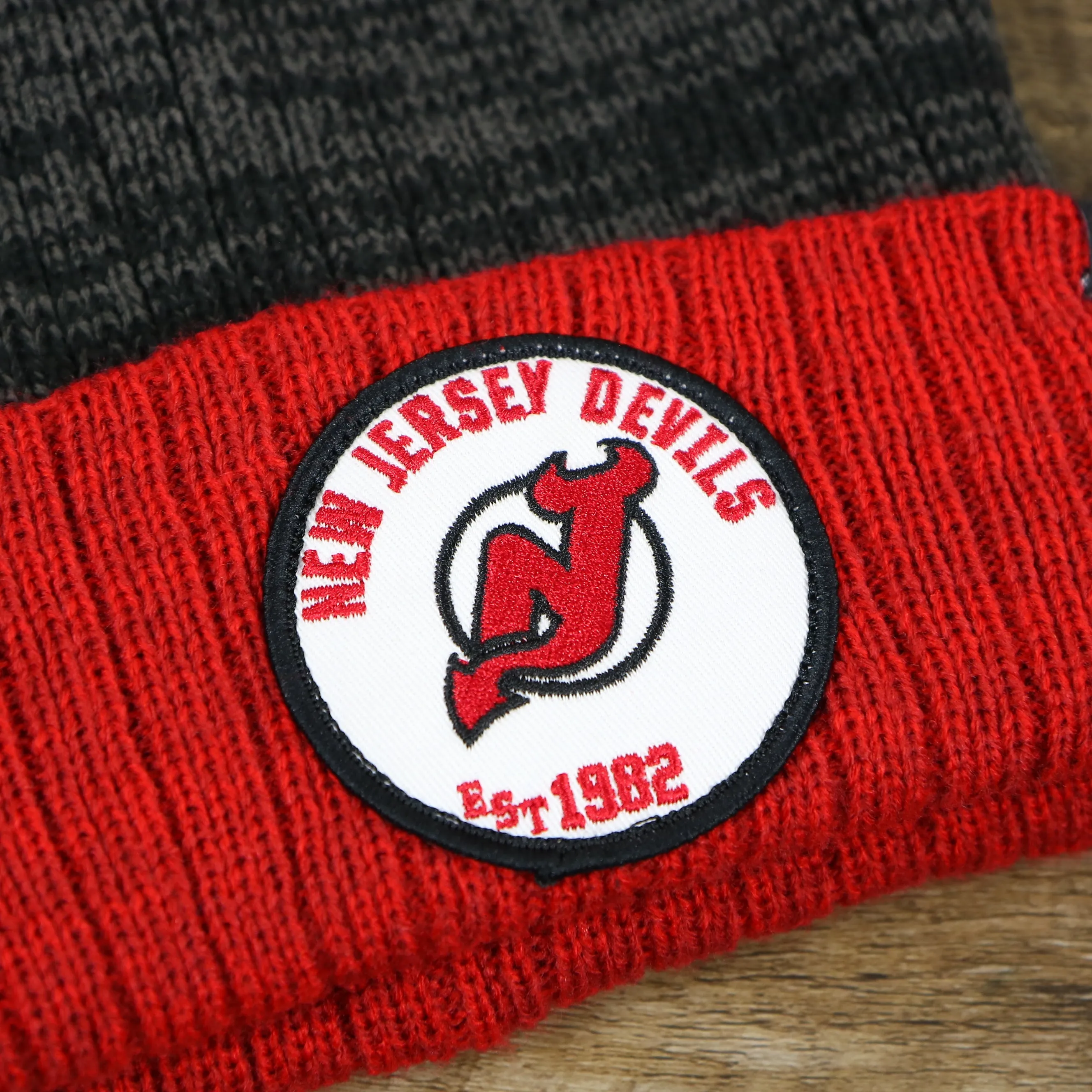 New Jersey Devils Winter Beanie - Red and Gray Striped Cuffed Pom Pom Hat